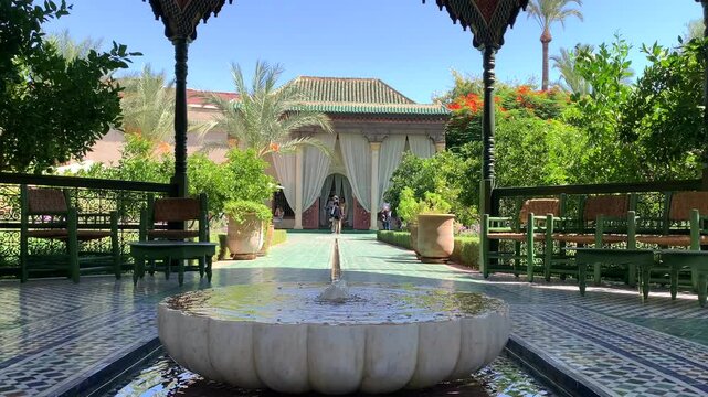 A marble water feature bowl in the covered central feature of the Islamic section in The Secret Garden, Le Jardin Secret, in the Medina district of Marrakech, Morocco.