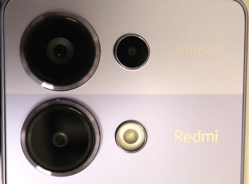 Kyiv, Ukraine. 10.10.2024:Close-up view of a smartphone Xiaomi redmi note 13 camera system showcasing advanced technology and design details. Stock editorial photo.