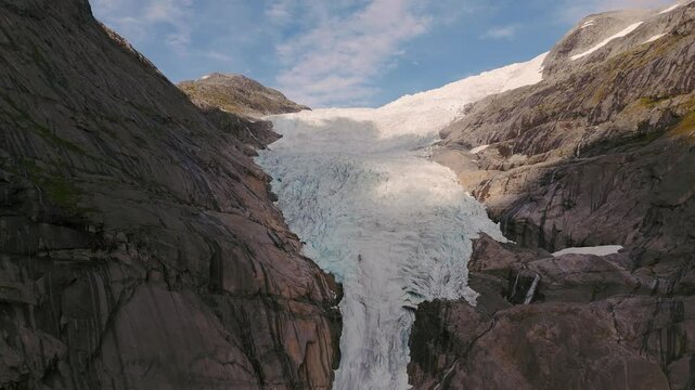 Briksdalsbreen Glacier in Norway, Briksdalbre, Scandinavia with thick ice. Epic mountain nature.