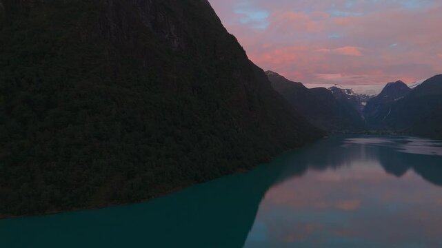 Oldevatnet lake at Briksdalsbreen glacier. Norway Scandinavia nature sunset sky water reflection
