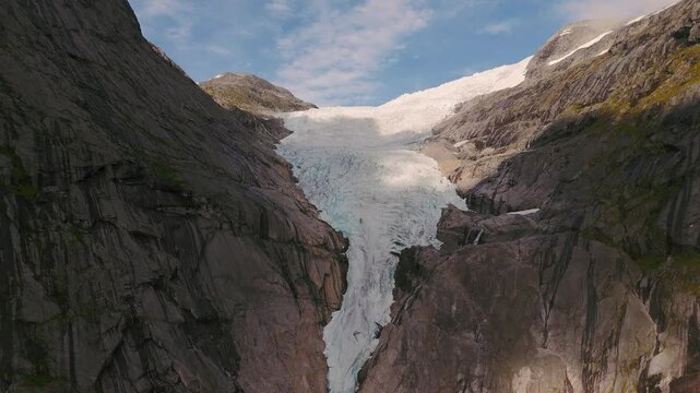 Epic Briksdalsbreen Glacier in Norway, Briksdal, Scandinavia with thick ice. Mountain sightseeing nature.
