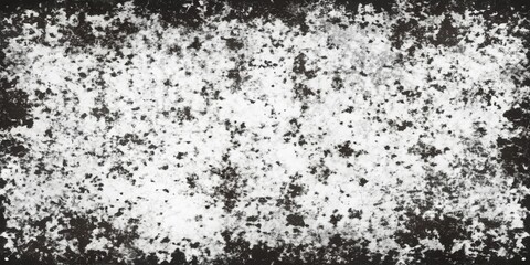 Fototapeta premium Abstract Black and White Distressed Surface with Randomly Scattered White Flecks on a Dark Background