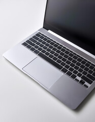 Laptop lying down on a white background