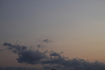 beautiful orange cloudy afternoon bright blue clouds, warm, sunset