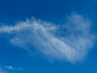 Blue sky with veil clouds background texture