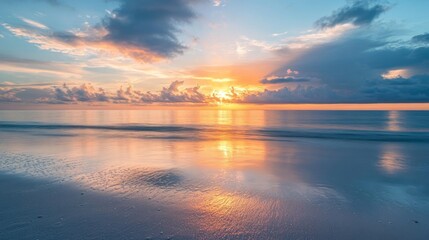 Obraz premium Sunrise on rocky shore with calm waters