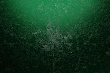 Street map of Brno (Czechia) engraved on green metal background. Light is coming from top. 3d render, illustration