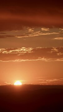 Brilliant Golden Sunrise with Clodus Timelapse Vertical Video