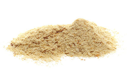 Nutritional yeast pile (deactivated yeast) isolated on white, side view