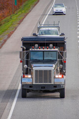 Naklejka premium Heavy truck on a Canadian highway in the fall in Quebec