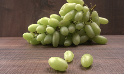 Natural organic different types of fresh ripe juicy grapes and space for text on table. top view, Agriculture concepts.