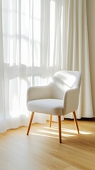 This modern living room features a stylish gray armchair made of beige leather, complemented by wooden legs, inviting relaxation in a sunlit space with greenery