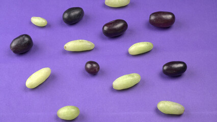 Natural organic different types of fresh ripe juicy grapes and space for text on table. top view, Agriculture concepts.