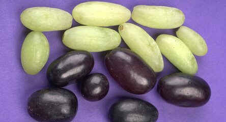 Natural organic different types of fresh ripe juicy grapes and space for text on table. top view, Agriculture concepts.