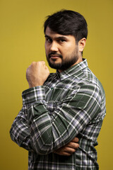 Obraz premium serious man, with his fist clenched