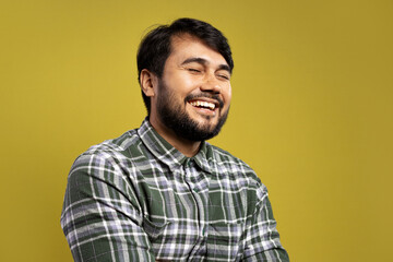 man with eyes closed, with an open smile