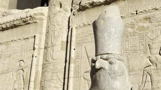 Discover the guardian of the Nile at the Temple of Edfu. Marvel at the imposing statue of Horus, the falcon-headed god who watches over ancient Egypt.