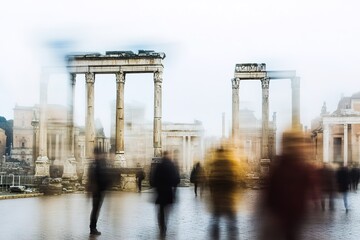 Naklejka premium Blurry crowd at Roman ruins, timeless and dynamic