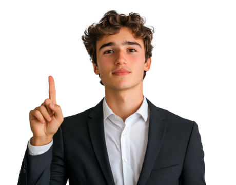 Young man in a black suit gestures confidently while pointing upwards in a neutral setting