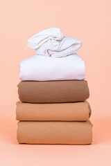 Stack of cozy, folded fabrics.