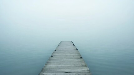 Obraz premium Empty fishing pier extending over the water, with space for copy in the sky