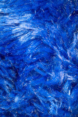 Texture of blue synthetic wool close-up
