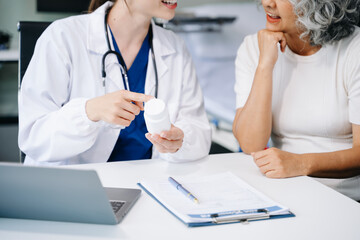 A professional physician talks to discuss results or symptoms and gives a recommendation to a male...