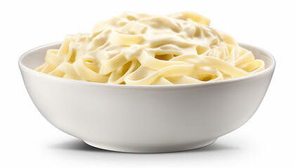 A bowl of fettucini alfredo isolated on white