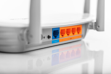 White WiFi router on a white background.
