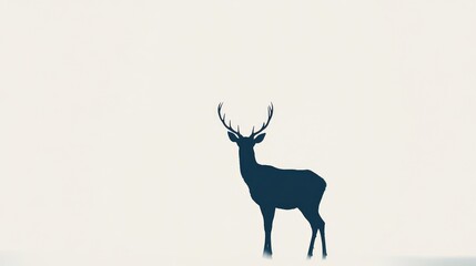 Silhouette of a majestic deer, its black form standing sharply against a bright white background, creating a simple yet dramatic image.