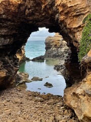 Coastal rock arch in Port Campbell National Park near the Great Ocean Road, Australia