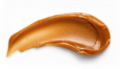 Obraz premium Smear of tasty caramel paste isolated on white background. Top view.
