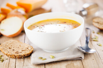 bowl of soup on wood background