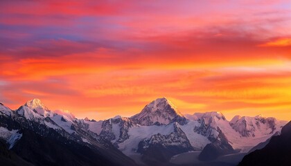 Obraz premium a vast landscape with snow capped mountains under a vibrant pink and orange sunset sky ai generated digital art