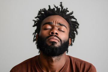 Obraz premium portrait of very worried and thoughtful man with afro hair and beard