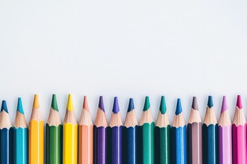 Vibrant Arrangement of Colored Pencils on Clean Surface