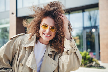 Fototapeta premium Photo of adorable nice girl dressed stylish beige clothes city megapolis autumn season sunny weather outdoors