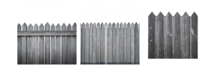 Gray wooden fence with pointed tops, viewed from the side.