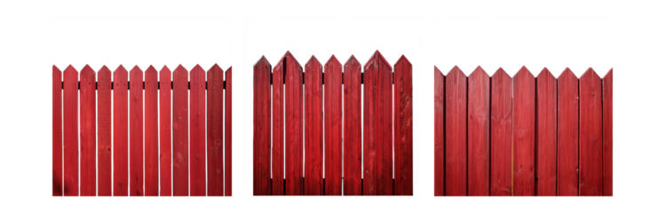 A red wooden fence with pointed tops.