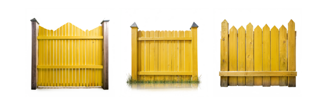 Three yellow wooden fences with a white background, two are tall and the third is shorter, all have triangular tops