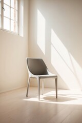 Sunlit studio with designer chair for editorial shoot.