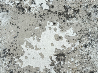 Weathered concrete texture with black and white patterns