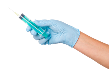 Hand in medical gloves holding a large syringe with a needle on an empty background. Medical procedures, vaccination, healthcare tools.