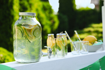 Lemonade stand with refreshing drink in park
