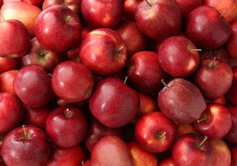 Fresh ripe red apples as background, top view