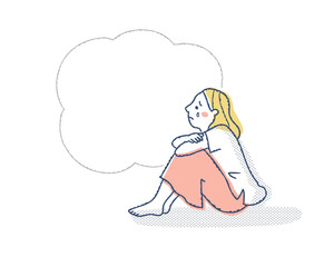 膝を抱えて泣いている女性とふきだし