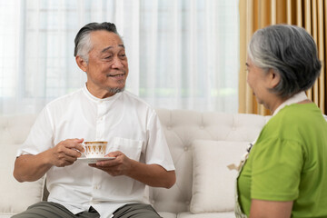 Senior Couple Sharing a Warm Moment with Coffee