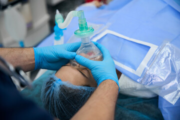 Patient under anesthesia on the operating table