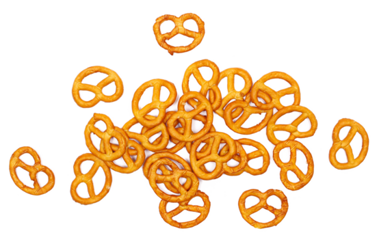 Salted pretzels pile, party snacks isolated on white, top view