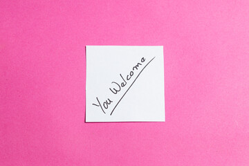 A white piece of paper with the word 